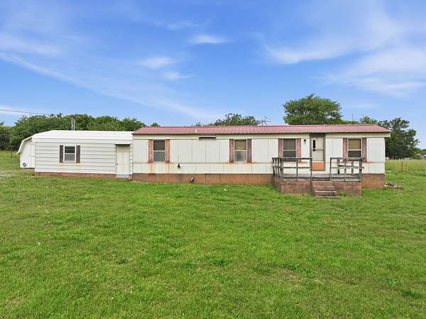1.5 Acres of Improved Mixed-Use Land for Auction in Christiana, Tennessee