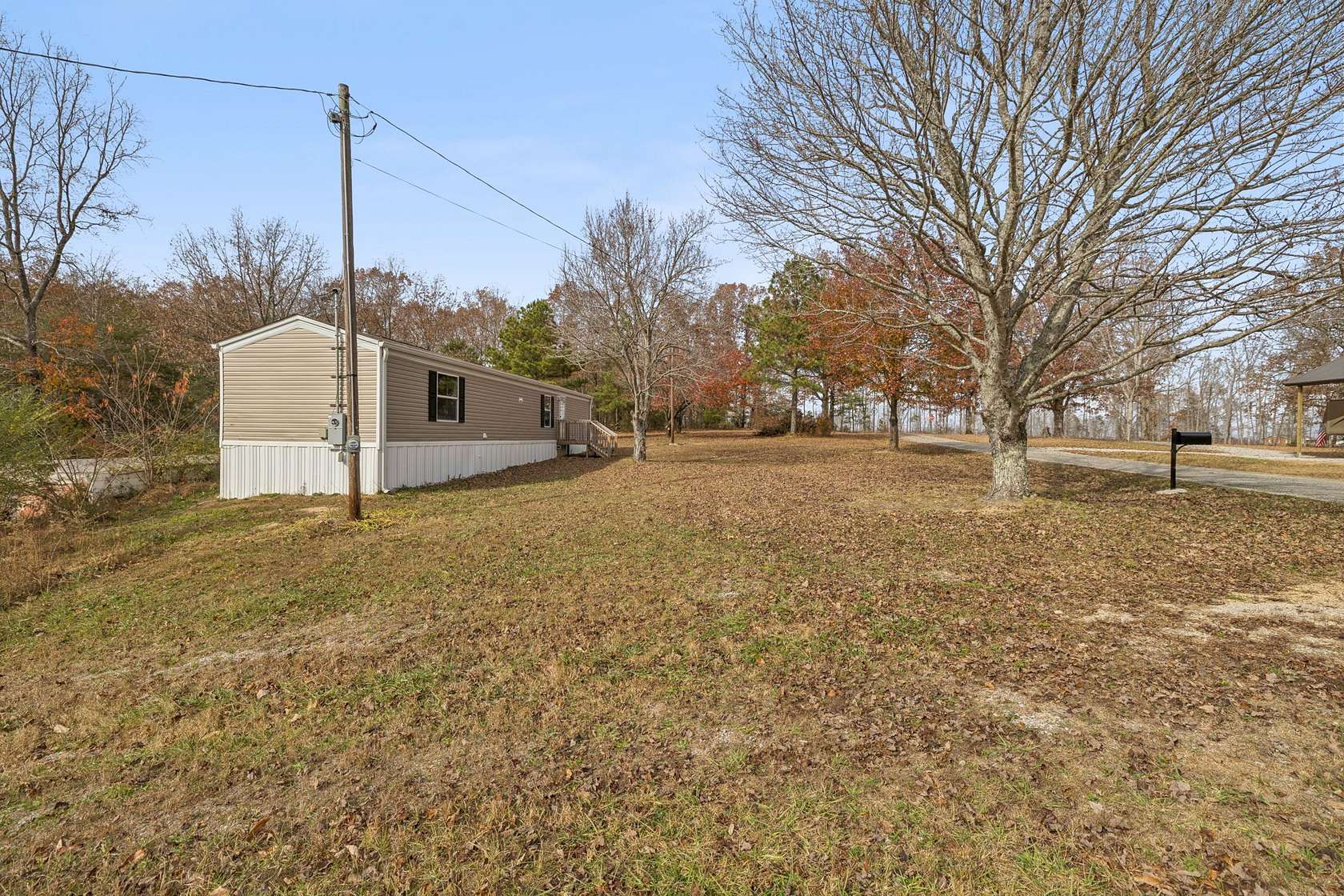 2.59 Acres of Land with Home for Sale in Hohenwald, Tennessee