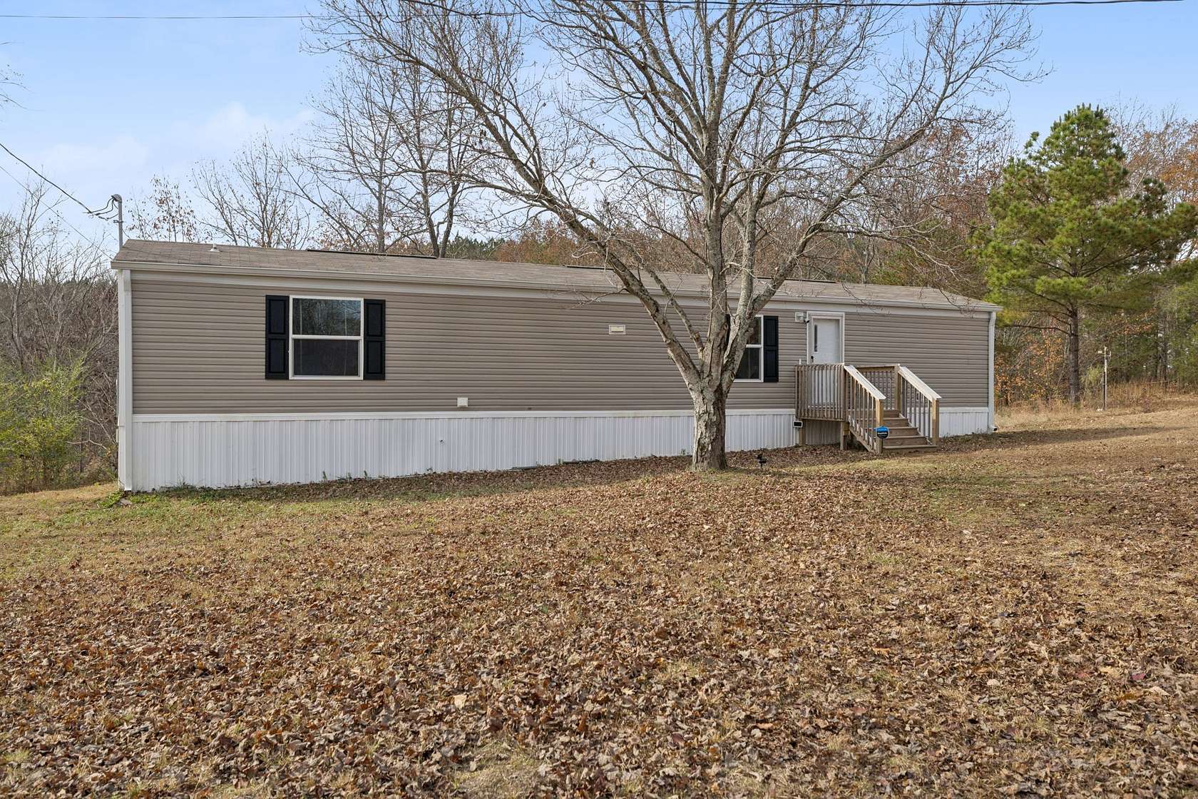 2.59 Acres of Land with Home for Sale in Hohenwald, Tennessee
