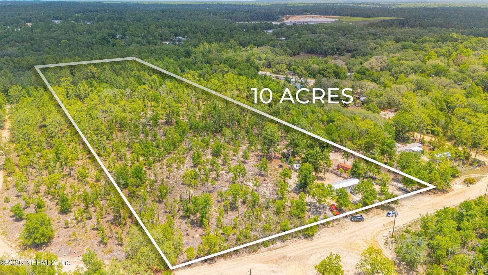10.2 Acres of Land with Home for Sale in Interlachen, Florida