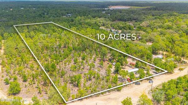 10.2 Acres of Land with Home for Sale in Interlachen, Florida