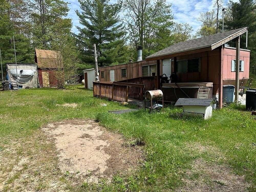0.85 Acres of Land with Home for Sale in Harrison, Michigan