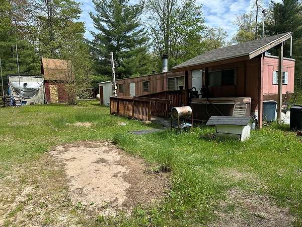 0.85 Acres of Land with Home for Sale in Harrison, Michigan