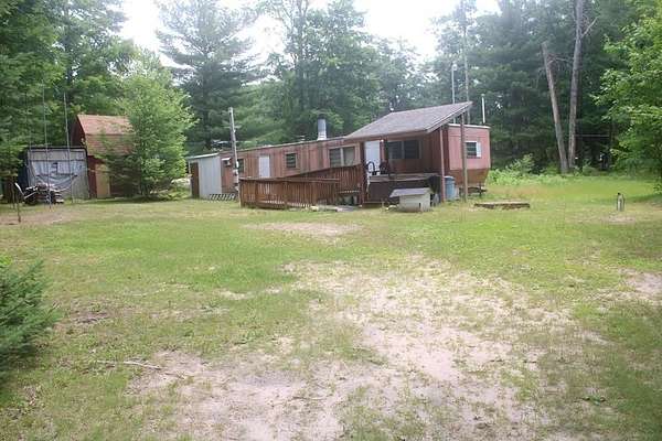 0.85 Acres of Land with Home for Sale in Harrison, Michigan