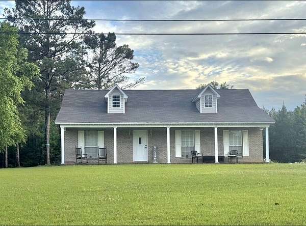 1.5 Acres of Land with Home for Sale in Nettleton, Mississippi