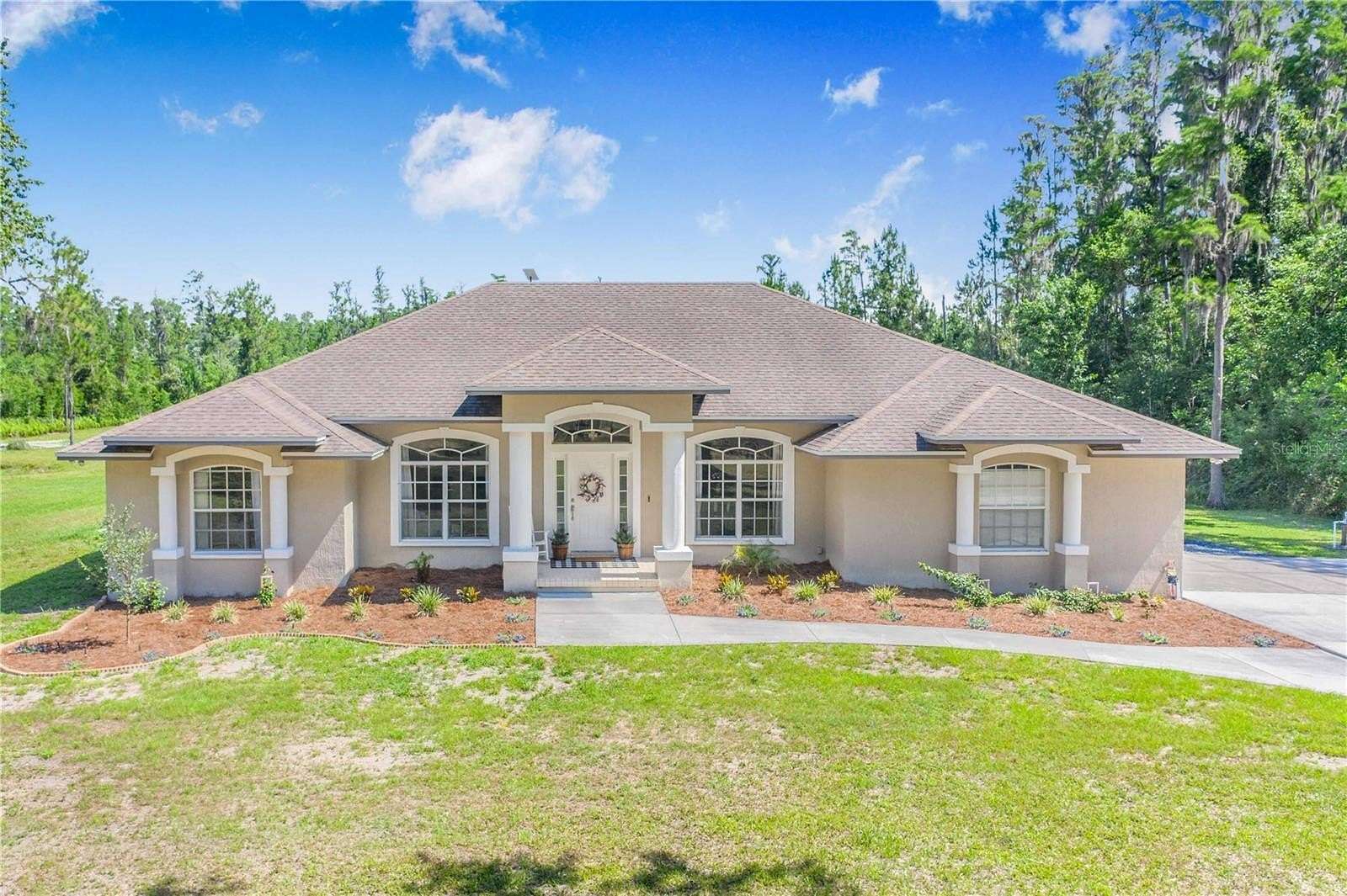 4.6 Acres of Land with Home for Sale in Polk City, Florida