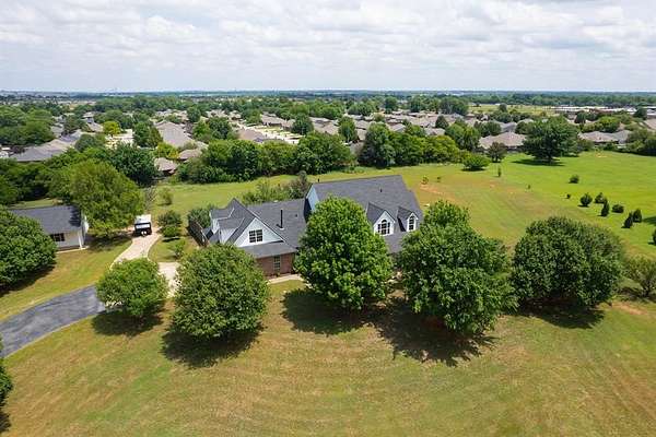 5 Acres of Land with Home for Sale in Yukon, Oklahoma