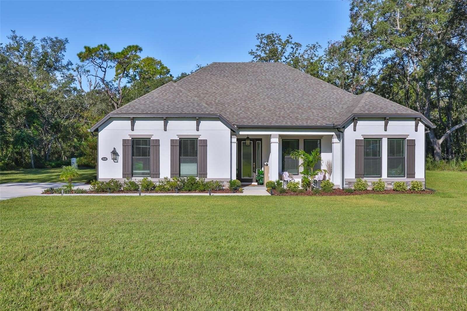 2.39 Acres of Land with Home for Sale in Hudson, Florida