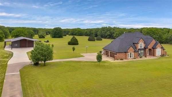 15.4 Acres of Land with Home for Sale in Quinlan, Texas