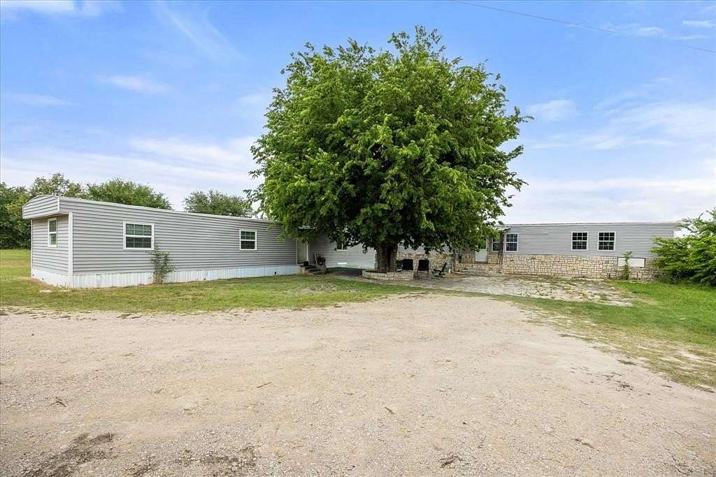 5 Acres of Land with Home for Sale in Glen Rose, Texas
