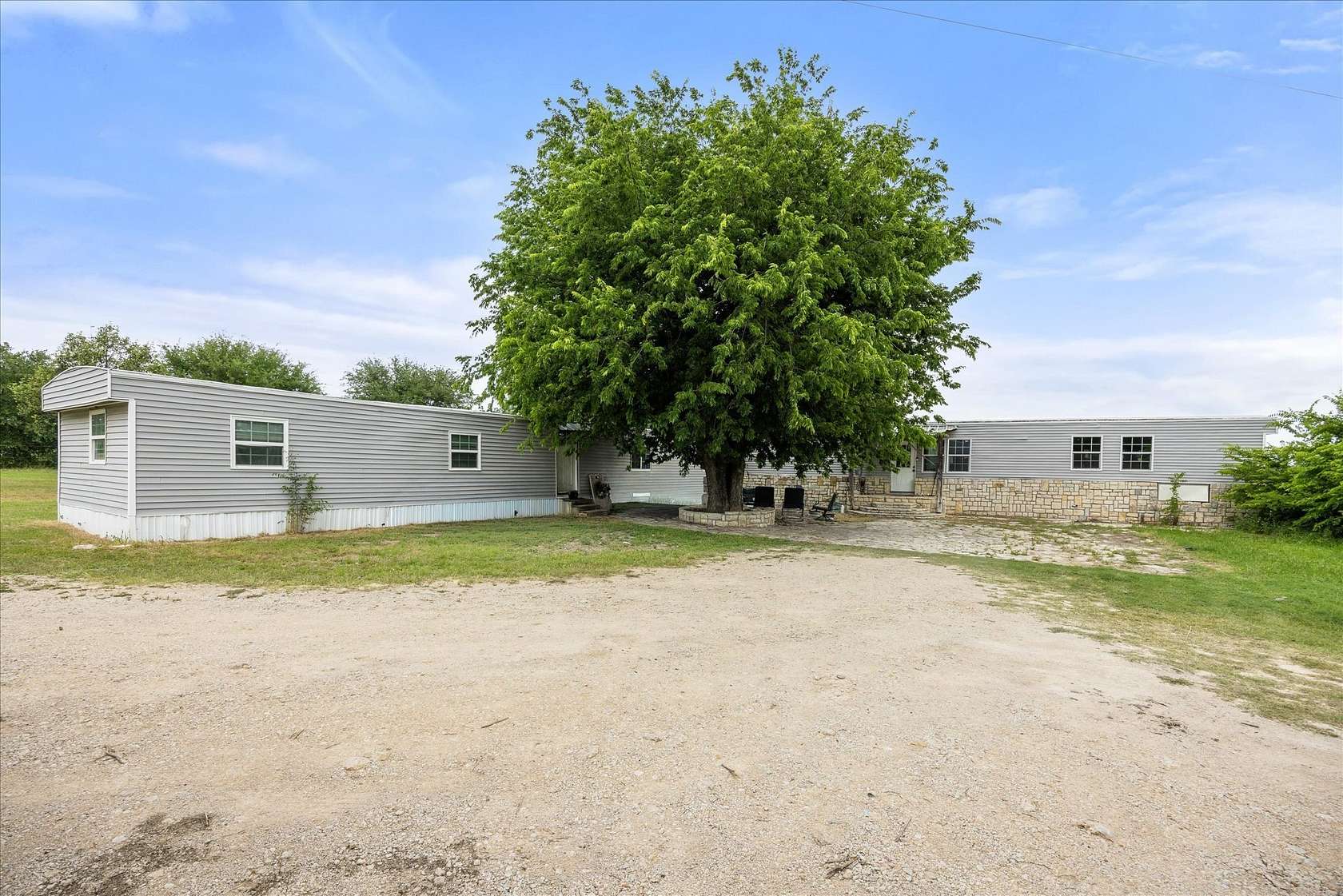5 Acres of Land with Home for Sale in Glen Rose, Texas