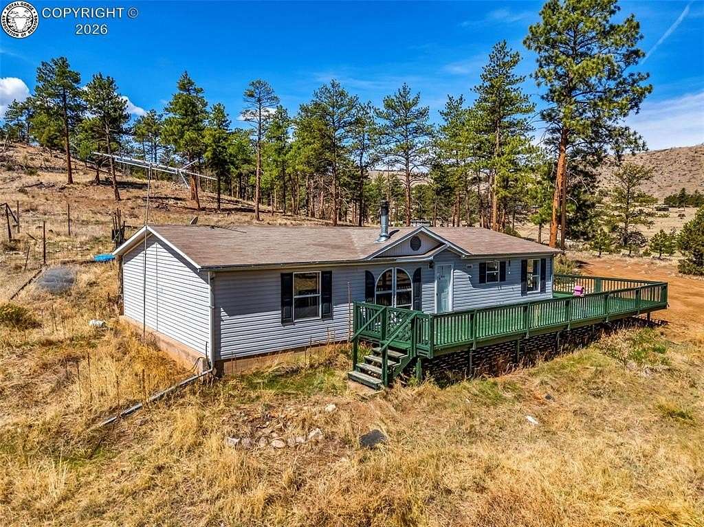 2.5 Acres of Land with Home for Sale in Cotopaxi, Colorado