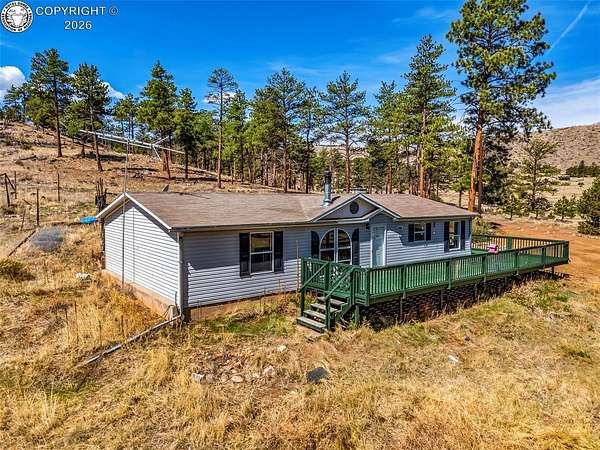 2.5 Acres of Land with Home for Sale in Cotopaxi, Colorado