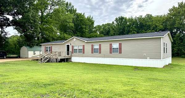 14.5 Acres of Land with Home for Sale in Ripley, Tennessee
