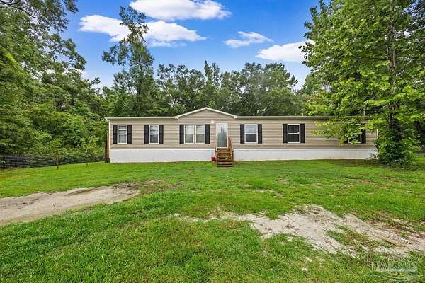 2.13 Acres of Land with Home for Sale in Century, Florida