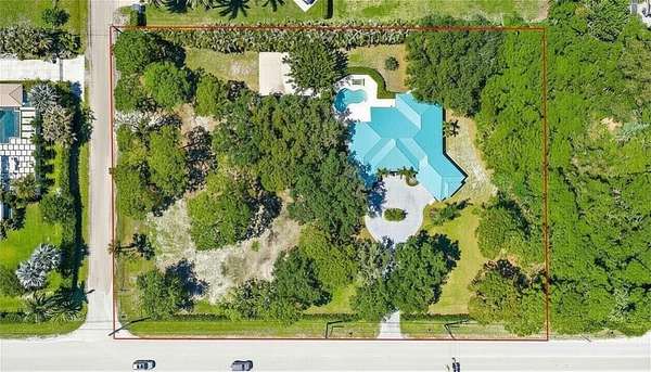 1.76 Acres of Land with Home for Sale in Palm Beach Gardens, Florida