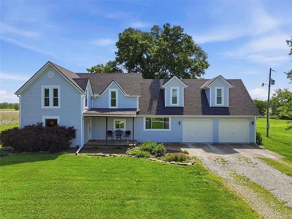 5 Acres of Land with Home for Sale in Garden City, Missouri