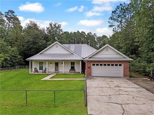 2.69 Acres of Land with Home for Sale in Slidell, Louisiana
