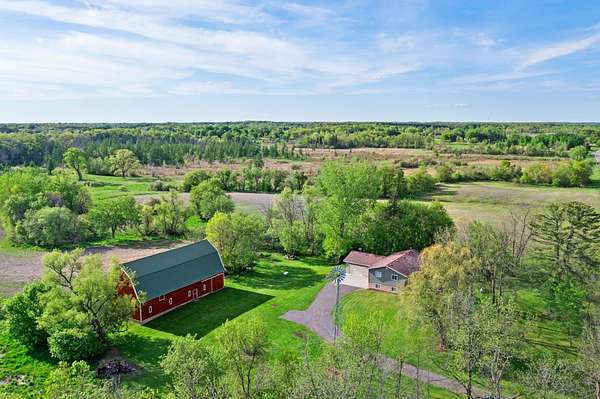 158 Acres of Land with Home for Sale in Stanchfield, Minnesota