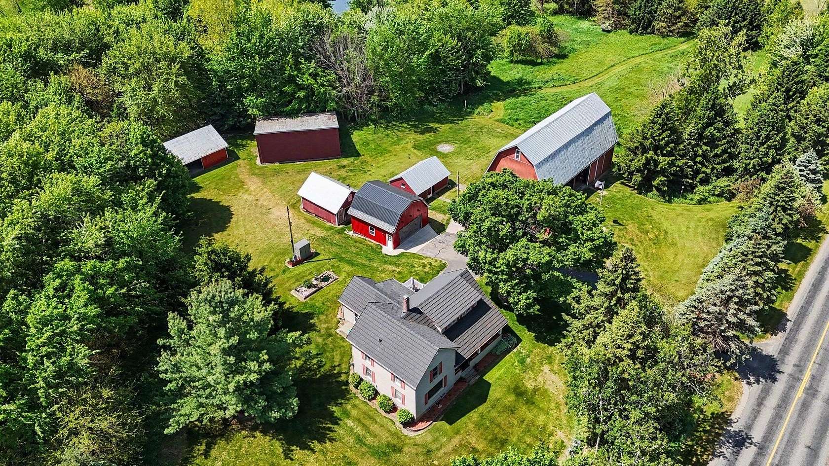 4.8 Acres of Land with Home for Sale in Alto, Michigan