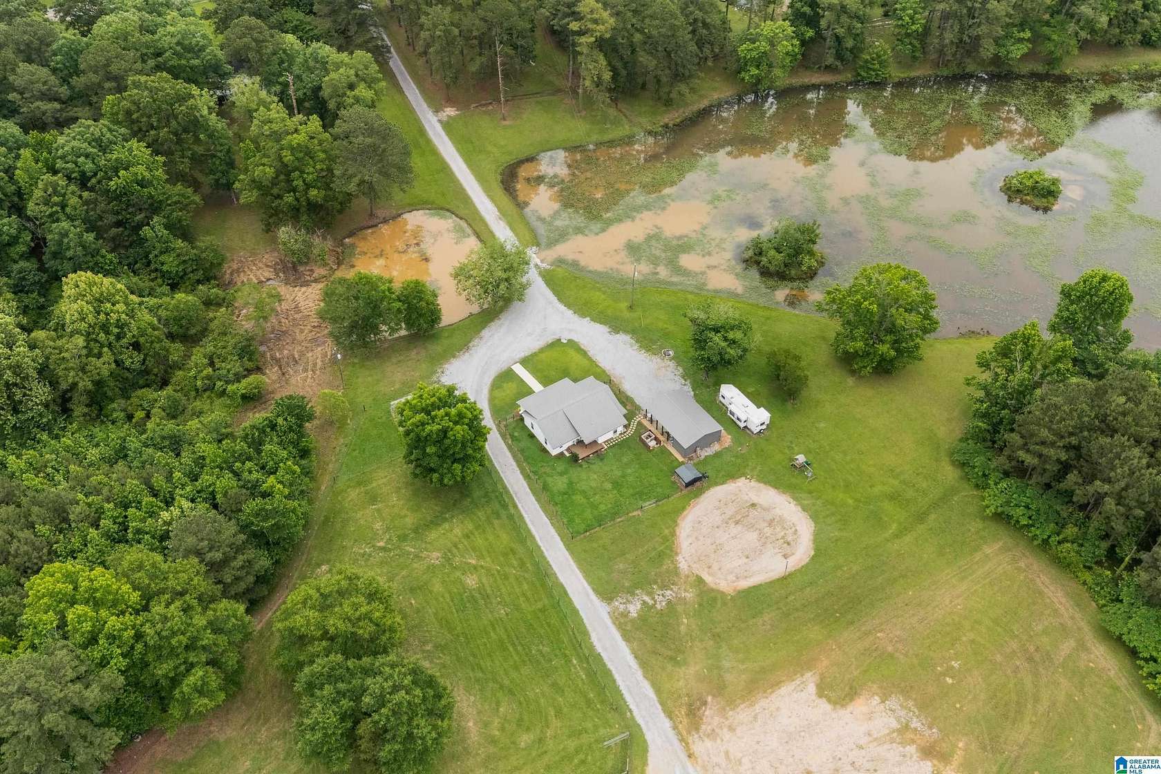21.9 Acres of Land with Home for Sale in Columbiana, Alabama