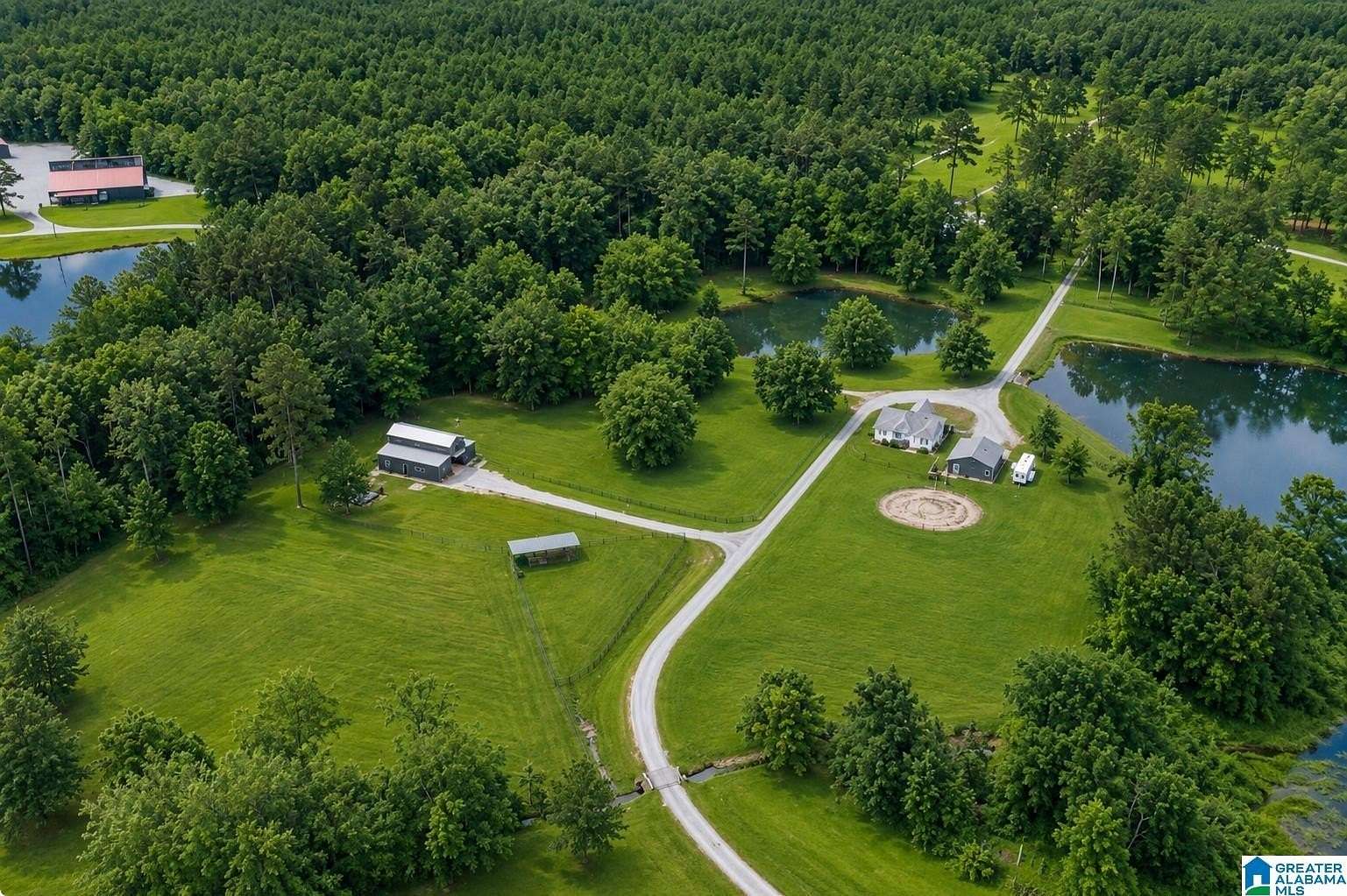 21.9 Acres of Land with Home for Sale in Columbiana, Alabama