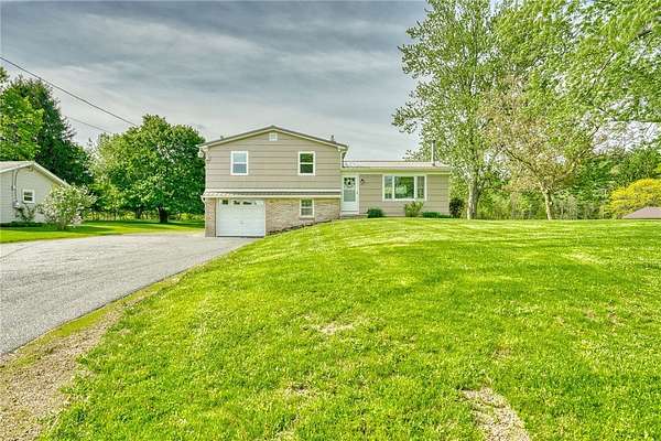 1.83 Acres of Land with Home for Sale in Webster, New York