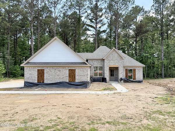 2.3 Acres of Land with Home for Sale in Brandon, Mississippi