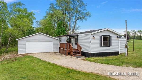7 Acres of Land with Home for Sale in Cedar Springs, Michigan