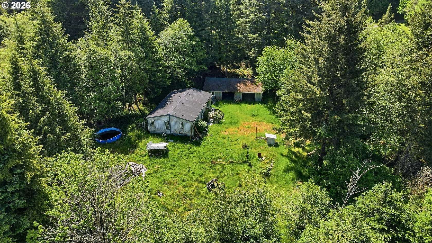 6.27 Acres of Land with Home for Sale in Coos Bay, Oregon