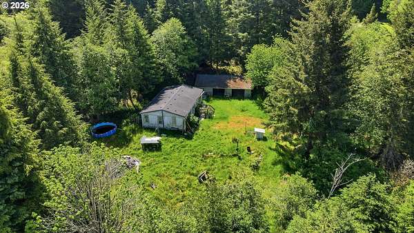 6.27 Acres of Land with Home for Sale in Coos Bay, Oregon