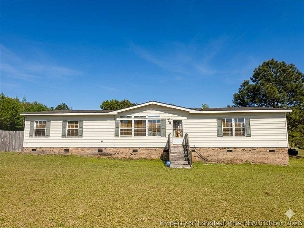 1.5 Acres of Land with Home for Sale in Bunnlevel, North Carolina