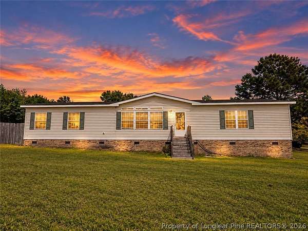 1.5 Acres of Land with Home for Sale in Bunnlevel, North Carolina
