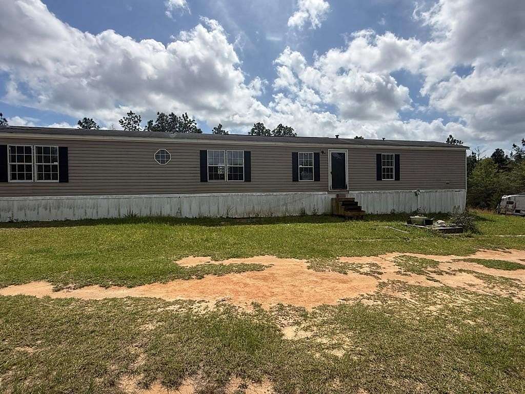 3.7 Acres of Land with Home for Sale in Lumberton, Mississippi