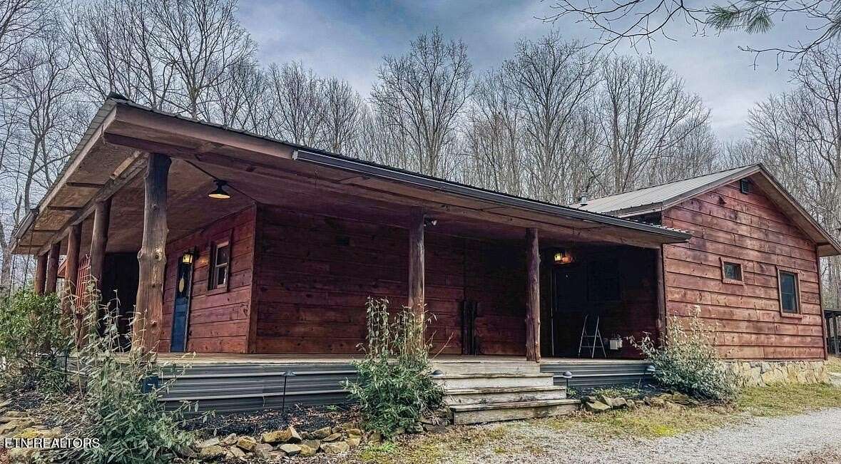 6.5 Acres of Land with Home for Sale in Oneida, Tennessee