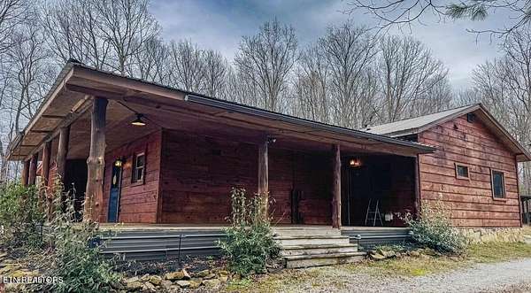 6.5 Acres of Land with Home for Sale in Oneida, Tennessee