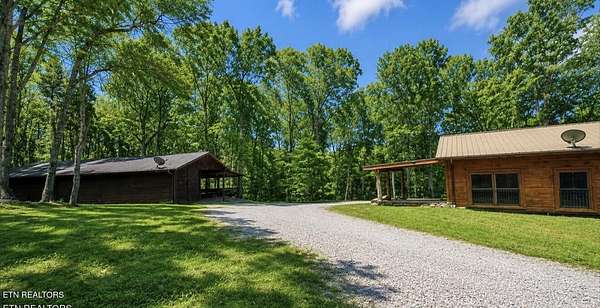 6.5 Acres of Land with Home for Sale in Oneida, Tennessee