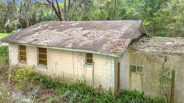 6.53 Acres of Land with Home for Sale in Belleview, Florida