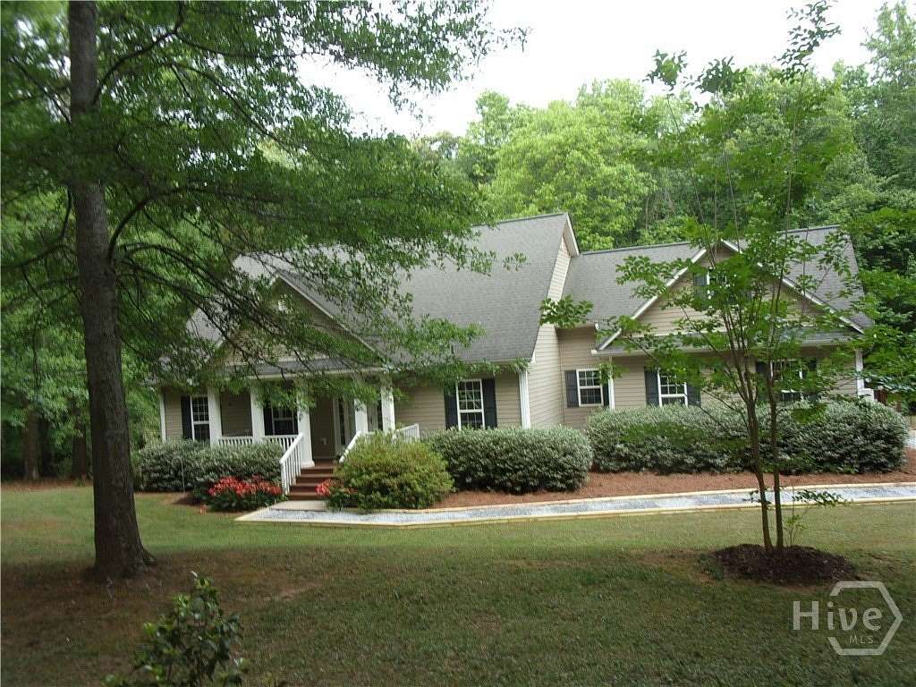 5.76 Acres of Land with Home for Sale in Comer, Georgia
