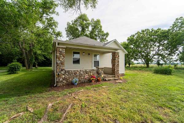 10 Acres of Land with Home for Sale in Ash Grove, Missouri