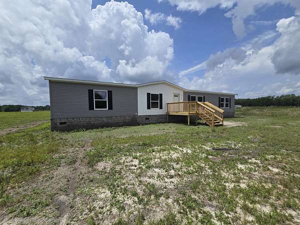 1.5 Acres of Land with Home for Sale in Bishopville, South Carolina