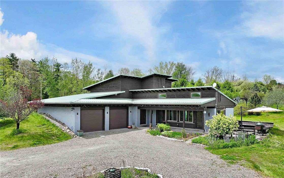 7.8 Acres of Land with Home for Sale in Newfield, New York