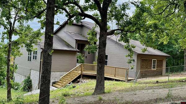 77 Acres of Recreational Land with Home for Sale in Mountain Home, Arkansas