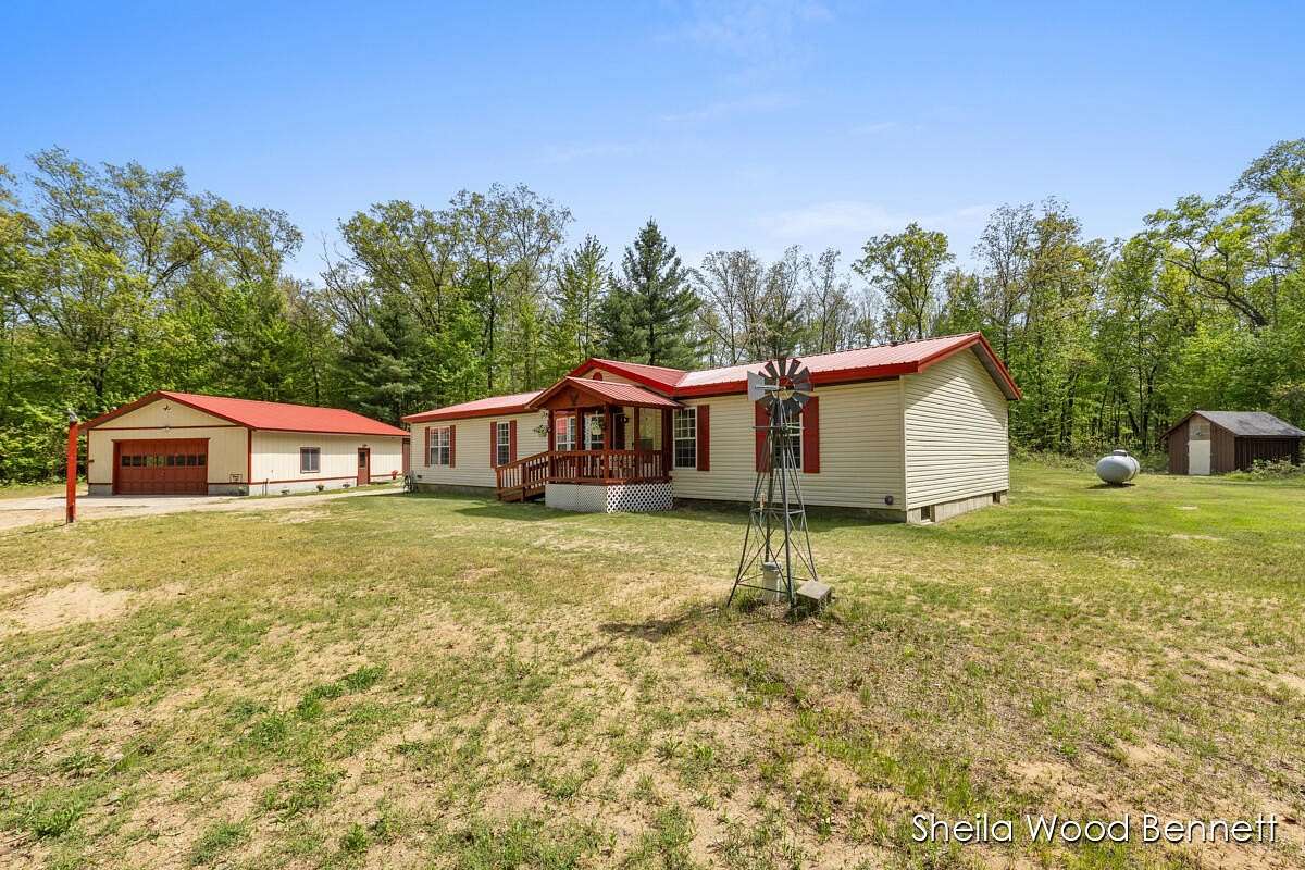 20 Acres of Recreational Land with Home for Sale in Howard City, Michigan