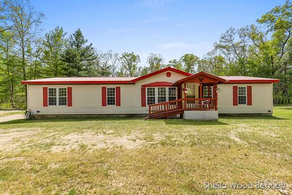 20 Acres of Recreational Land with Home for Sale in Howard City, Michigan