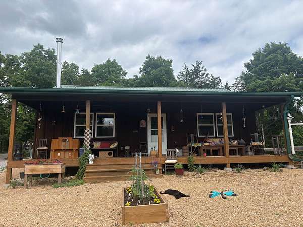 31 Acres of Recreational Land with Home for Sale in Gainesville, Missouri