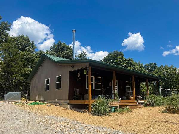 31 Acres of Recreational Land with Home for Sale in Gainesville, Missouri