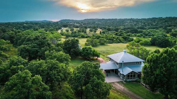 70.5 Acres of Agricultural Land with Home for Sale in Llano, Texas
