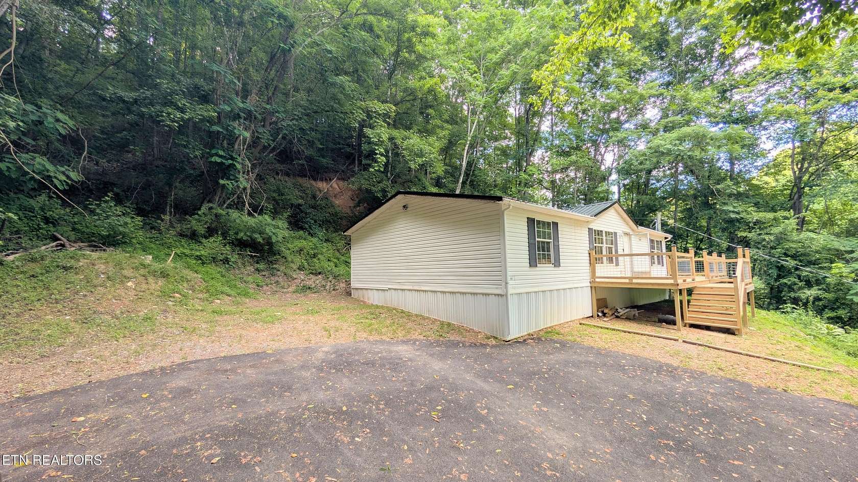 2 Acres of Land with Home for Sale in Sevierville, Tennessee