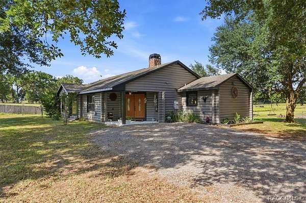 5.28 Acres of Land with Home for Sale in Dade City, Florida